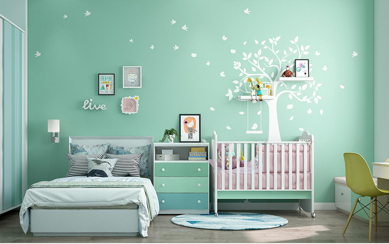 Phòng ngủ dành cho bé khá đẹp và dịu nhẹ với gam màu xanh