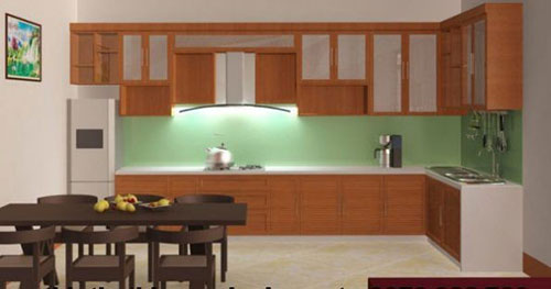 Phòng bếp có hệ thống tủ bếp và bàn ghế ăn tiện nghi